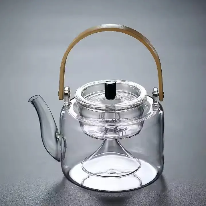 Clear Teapot With Infuser Built-In Glass Filter Separates Tea Leaves Clear Teapot With Infuser Built-In Glass Filter Separates Tea Leaves