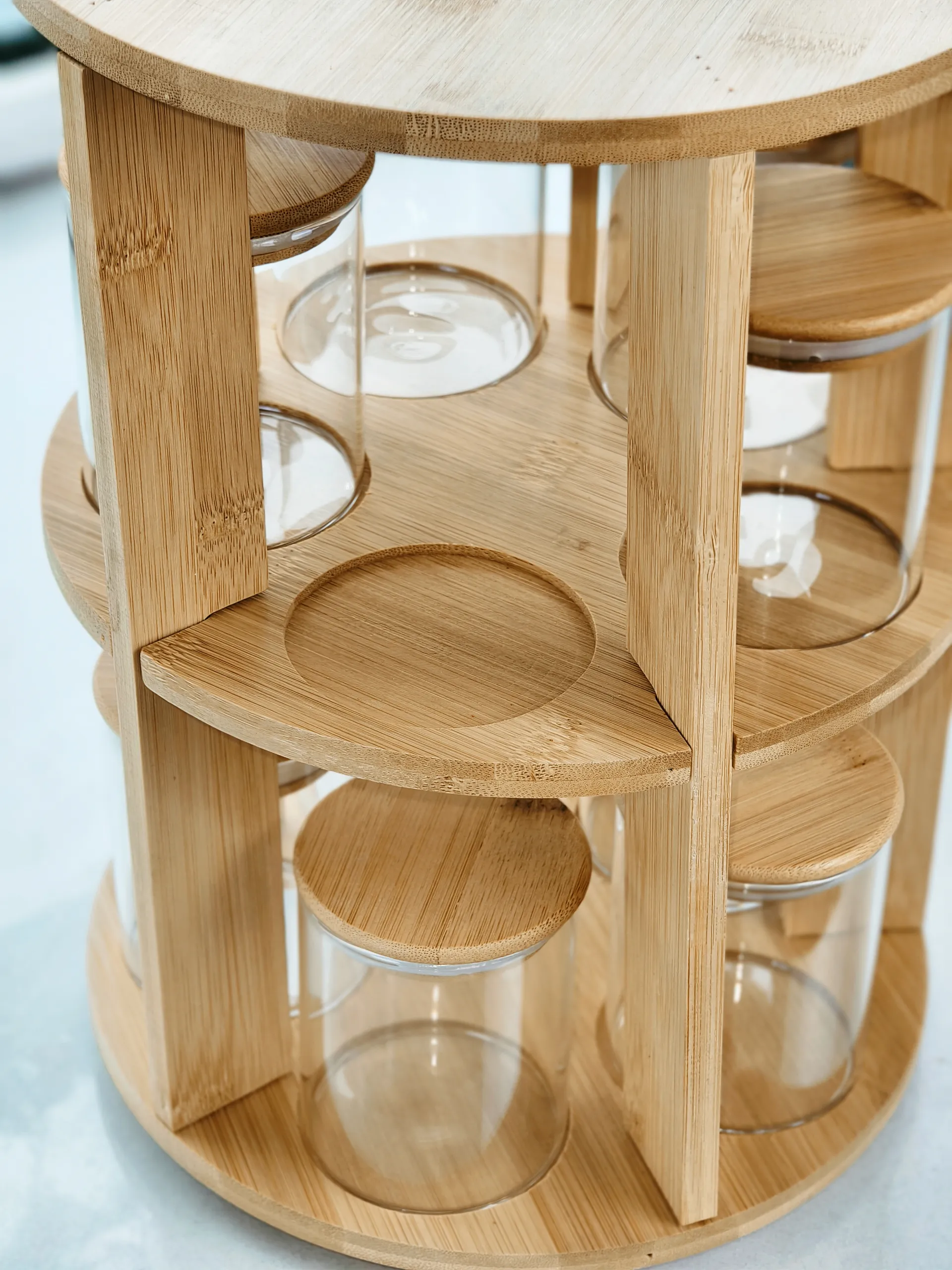 2 tier rotating bamboo rack housing ​10 pristine high-borosilicate glass jars