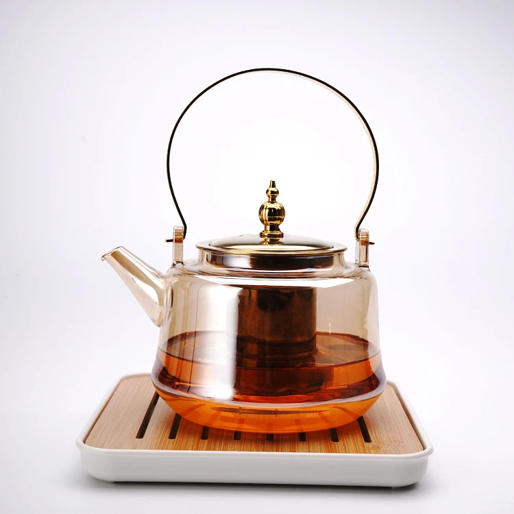 amber kettle with cooper handle lifting beam
