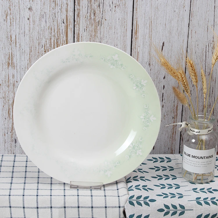 ​The Celadon Rim Porcelain Plate: A Dance of Botanicals and Light​